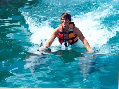 Nado con 2 delfines en Riviera Maya y buffet 75min