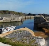 Tour en barco para chavos en el puerto de Ballintoy 1,5 h