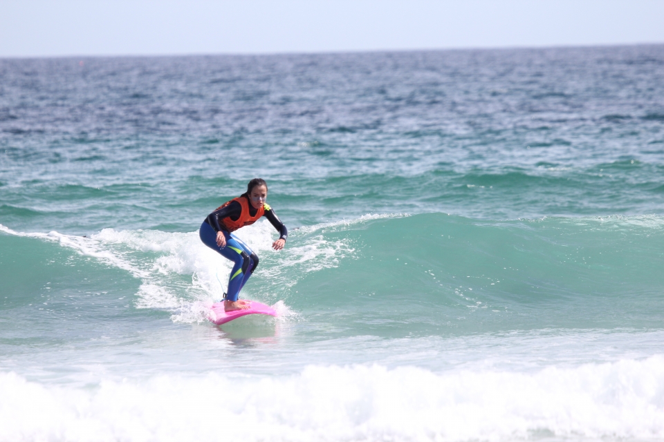 Alumna surfeando en Barreiros Alumna surfeando en Barreiros