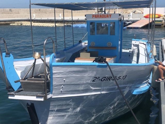Embárcale en una antigua barca de pescadores