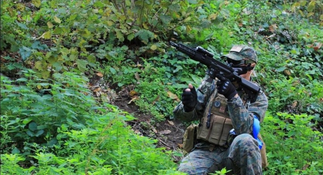  Rifle y camuflaje 