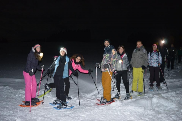  Raquetas de nieve con la luna llena 