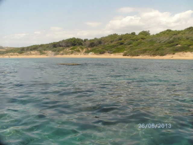 Capo Cimiusted desde el mar 