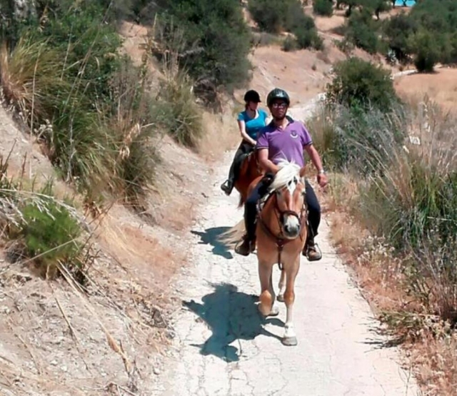  a caballo