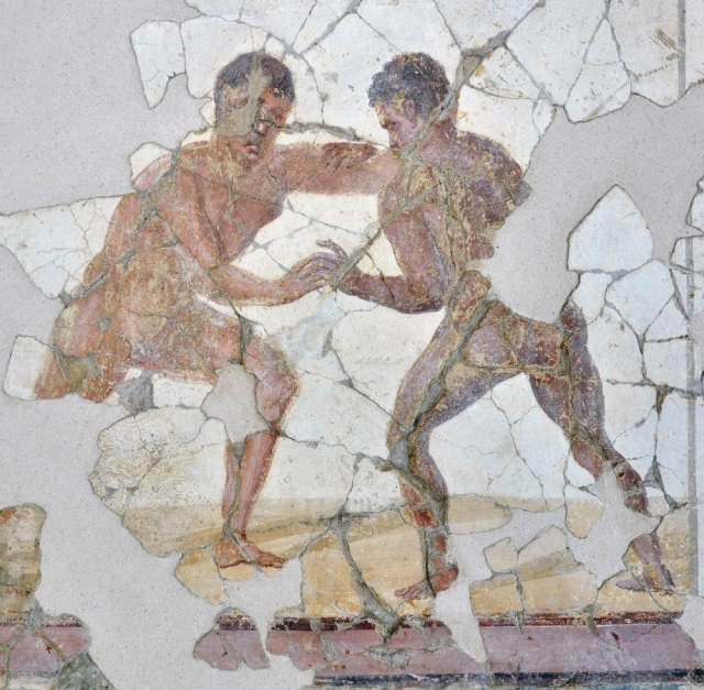  Fresco de hombres luchando 