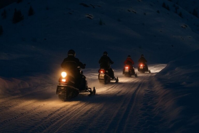  Paseo nocturno en moto de nieve por paisajes nevados