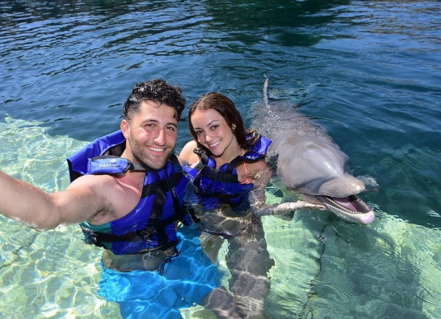  Couple visiting the dolphins 