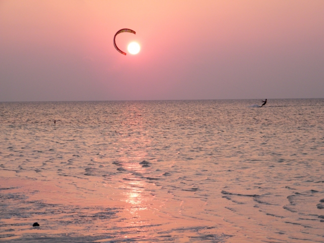  Kitesurfing at sunset 