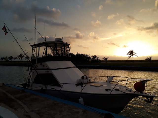 Boat at sunset at the Caribbean dock 