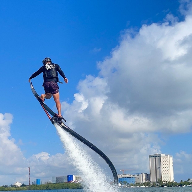  Soaring on a board over the water