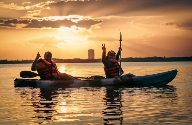  Kayaking in a lagoon at sunset 