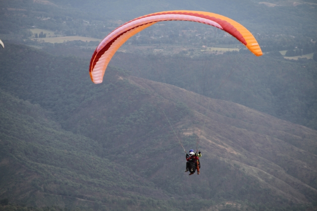  Paragliding flight over mountains 