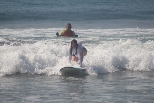  Surf instructor and student 