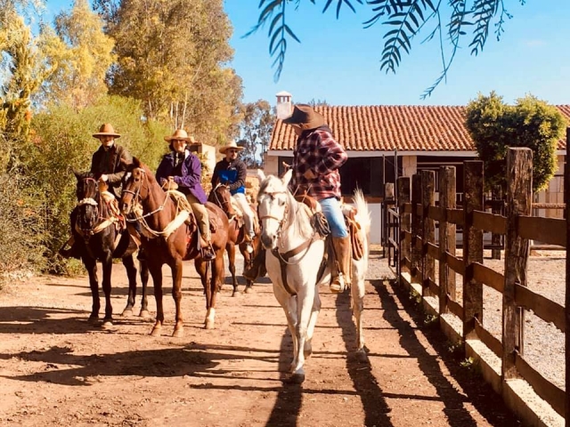  Leaving the village on horseback 