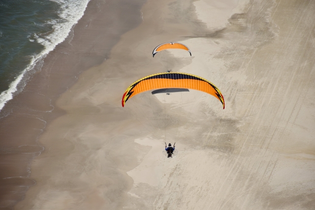  Fly over the beach on a paramotor 