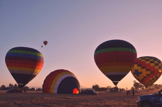  Spectacular sunrise with hot air balloons 