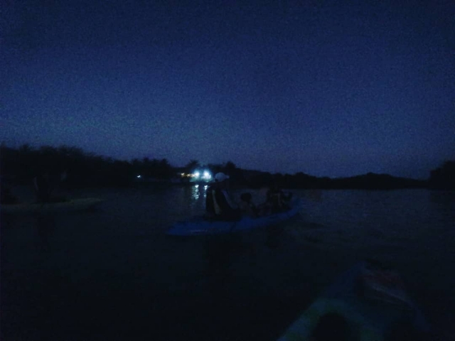  Kayaks at night