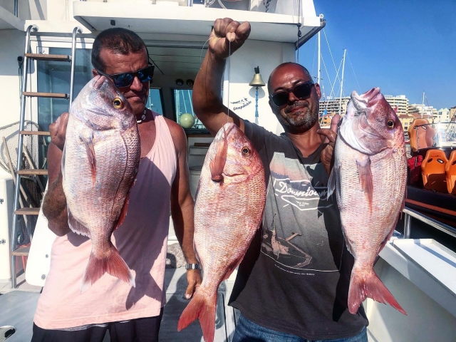 Contentos con la pesca