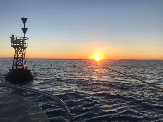  Sesión de pesca duranle la puesta de sol 