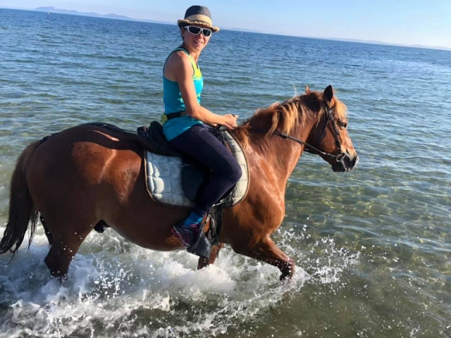 Pbaños a caballo por la playa 