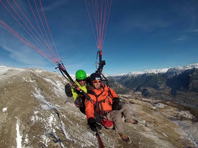 Vuelo en parapenle biplaza sobre los Alpes