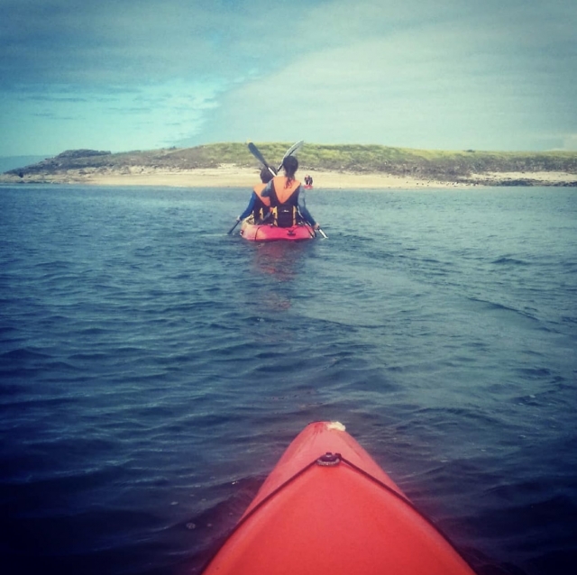  Kayak tándem en el mar 