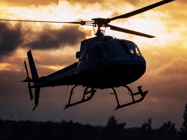  Vuelo en helicóptero al atardecer 