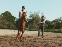  Horse riding with instructor